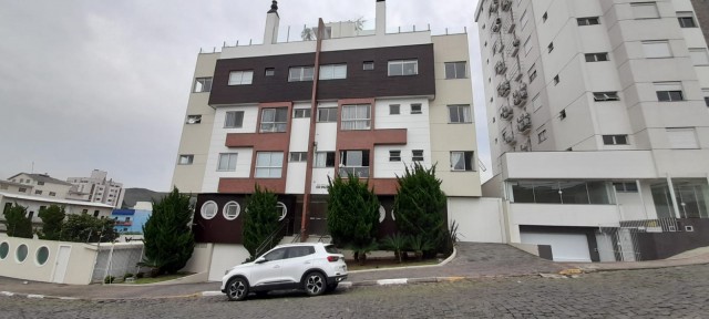 Apartamento 02 dormitórios (01 suíte)- Centro 