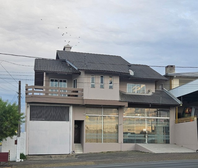 Casa 03 dormitórios (01 suíte)- Santa Catarina 